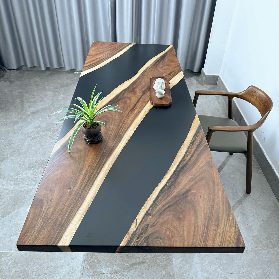 Solid walnut office desk with black resin inlay and matte finish, modern workspace