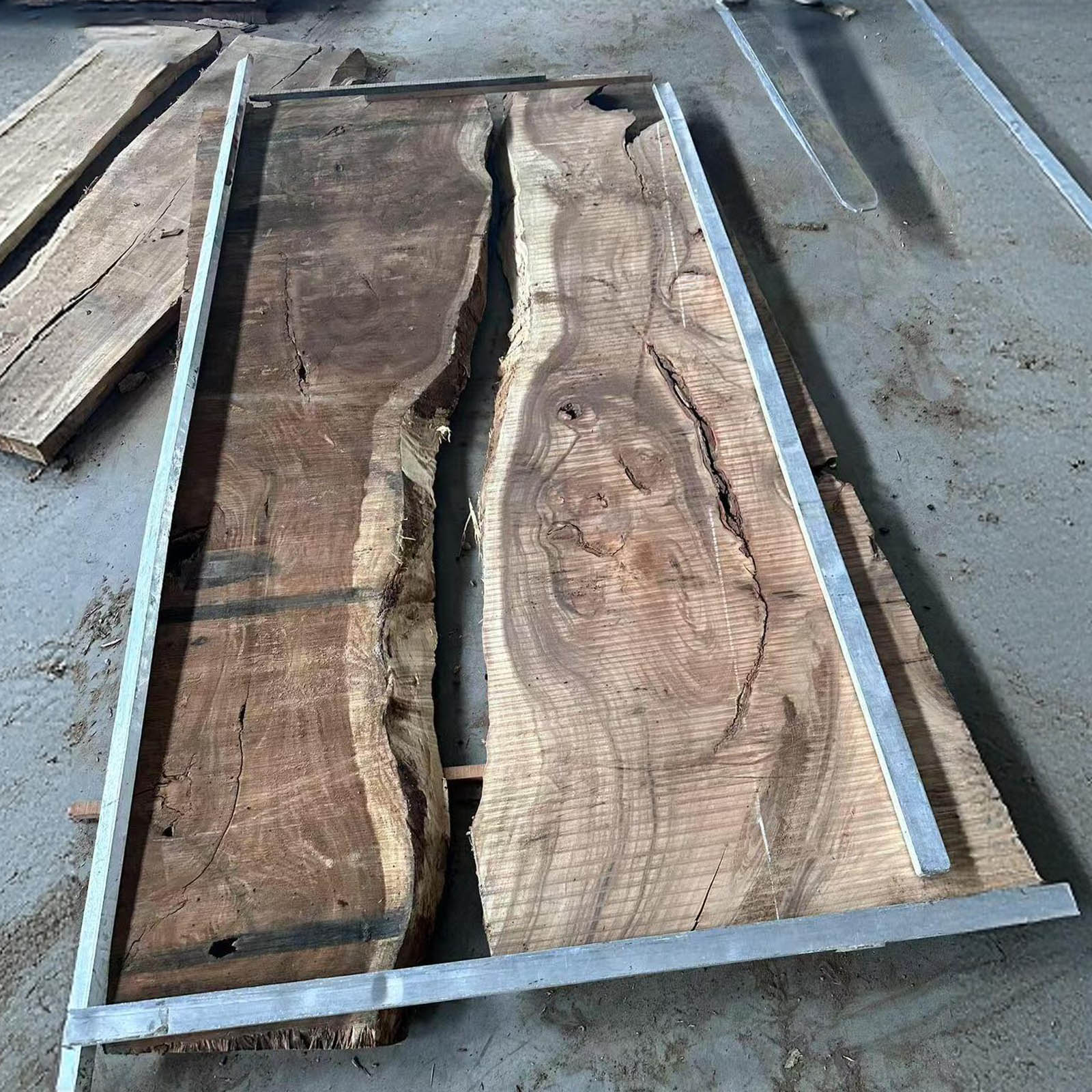 Handcrafted walnut wood dining table with white epoxy river, solid wood craftsmanship by Seawavetable.