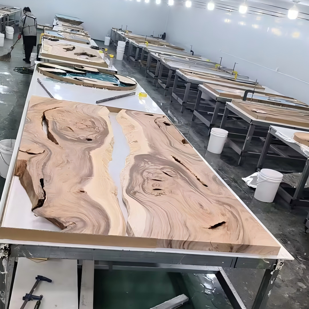 Modern live edge walnut dining table with white resin river, perfect for elegant interiors