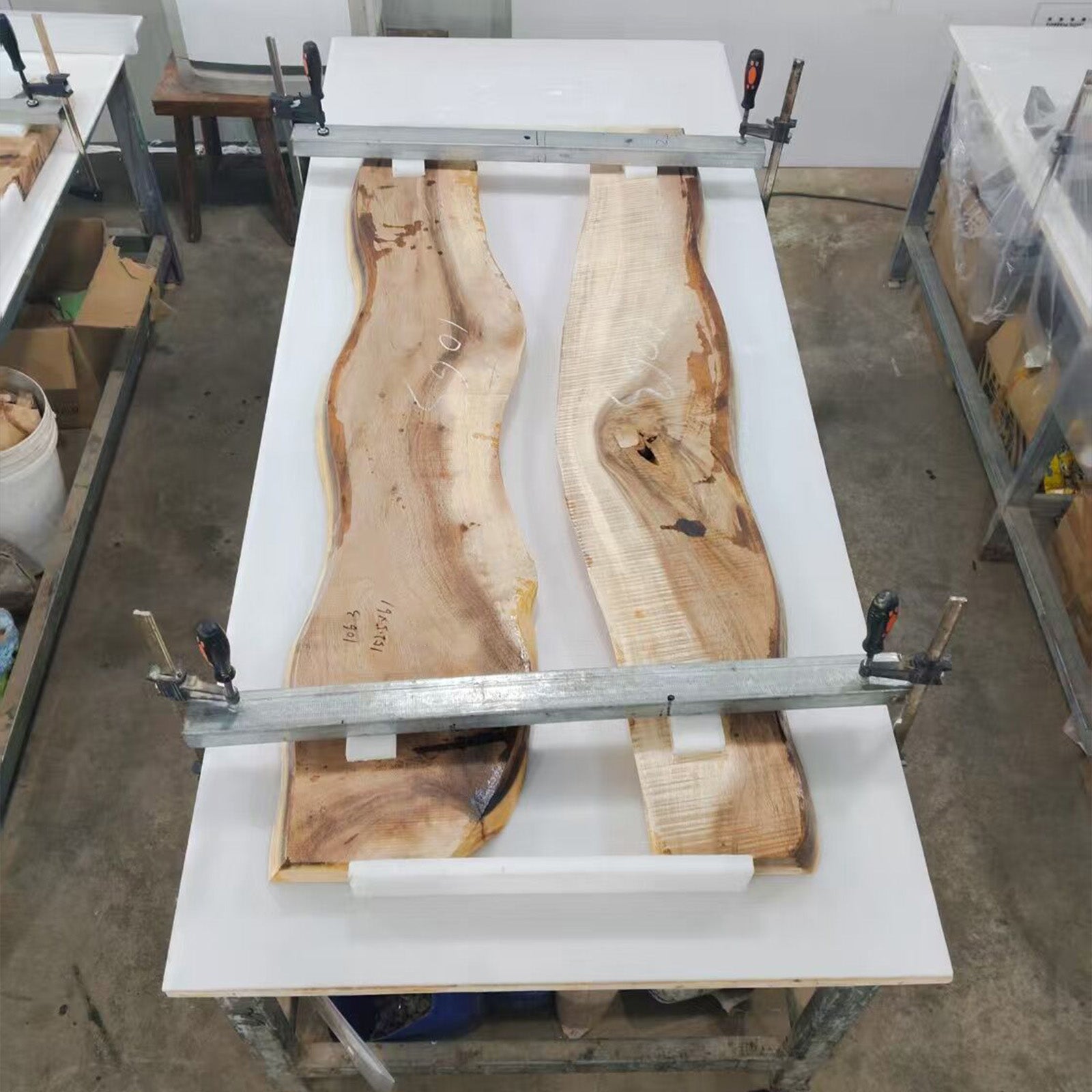 Sanded walnut wood slab prepared for epoxy river table
