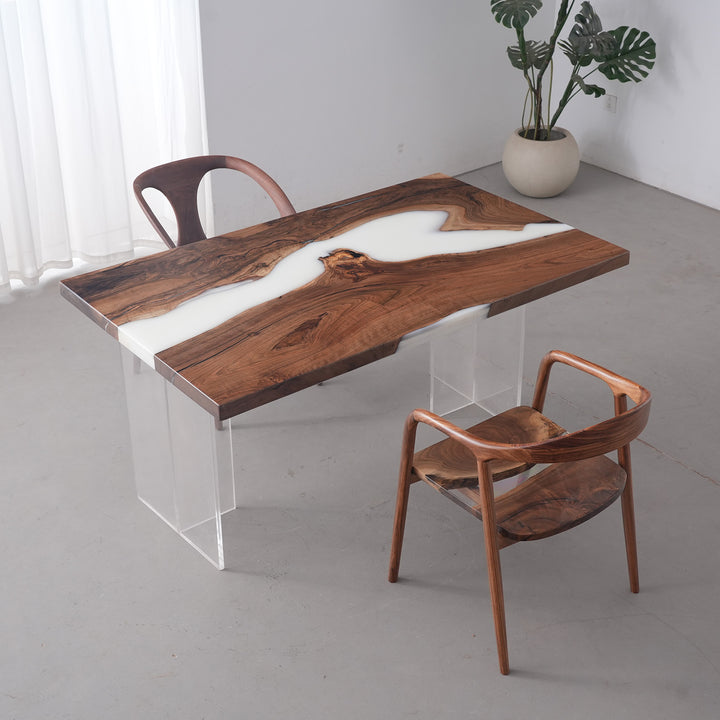 Custom wood dining table with epoxy center, ideal for kitchens and dining areas